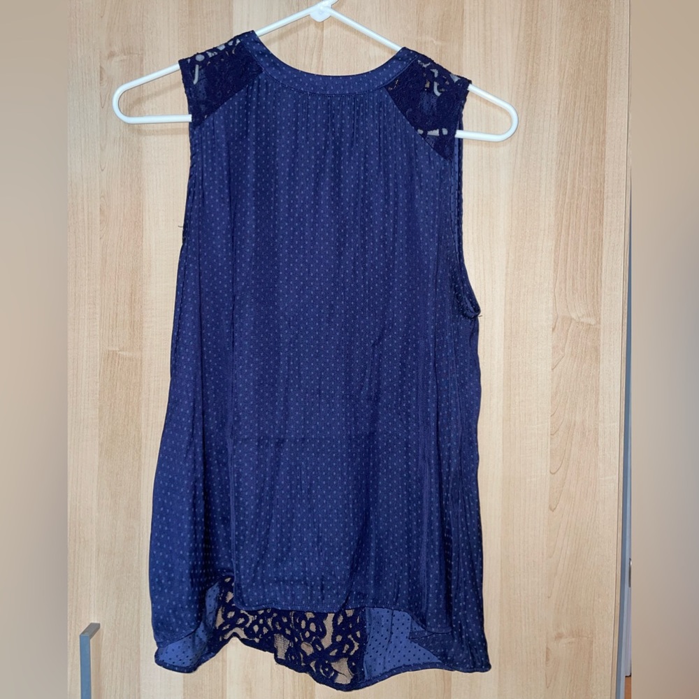 Forever 21 Navy Blue tank, with lace at the shoulders and on the back.